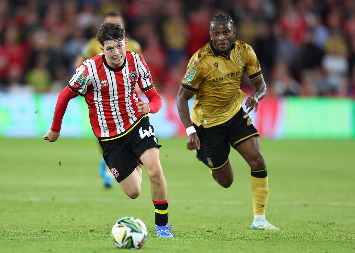 Owen Hampson breaking forward in a first-team match